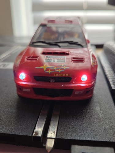 Scalextric vintage red subaru - vintage,