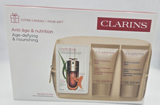 Clarins Age Defying Gift Set Nutri Lumiere Day & Night 2x15ml Double Serum 0.9ml