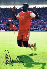 Signed Victor Wanyama