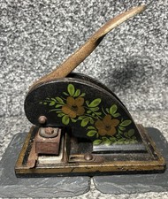 vintage cast iron embossing stamp or paper embosser. 
