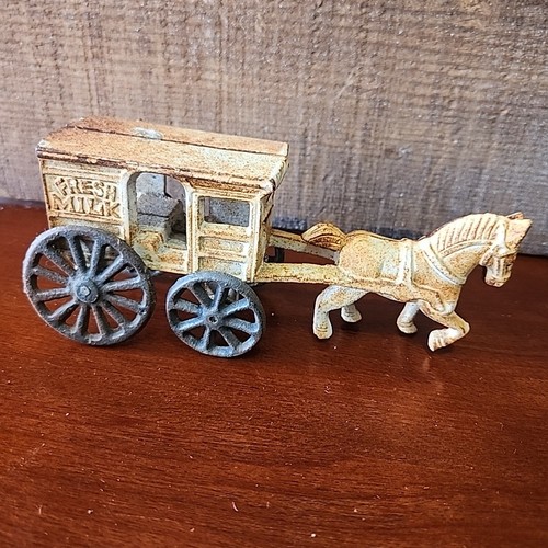 Cast iron horse drawn - horse,