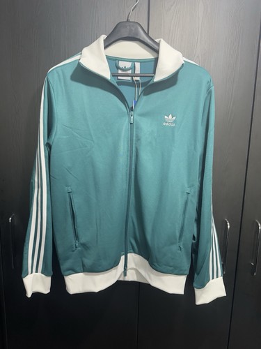 Adidas firebird teal and - and, white