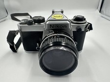 Nikon FE 35mm Film SLR Camera Body with Nikon Nikkor 1:2 50mm Lens