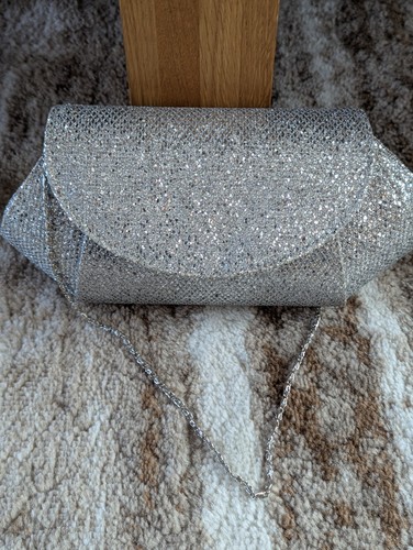 Roland cartier silver clutch - roland,
