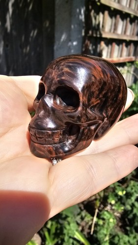 Carved mahogany obsidian - carved, skull