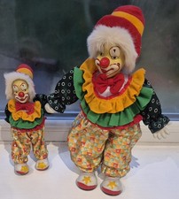 2X Porcelain Clowns Holding