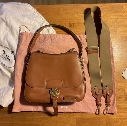 Barely used miu - miu,