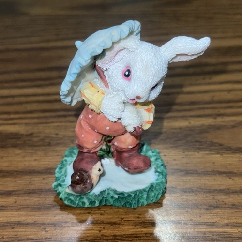 Bunny rabbit figurine snail - bunny,
