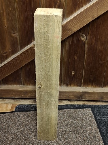 Tanalised timber offcut from