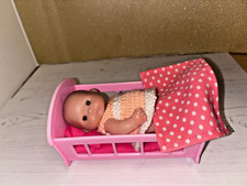 5" Itty Bitty Berenguer Doll (preloved) with Dress and Pink and Pink Rocking Cot