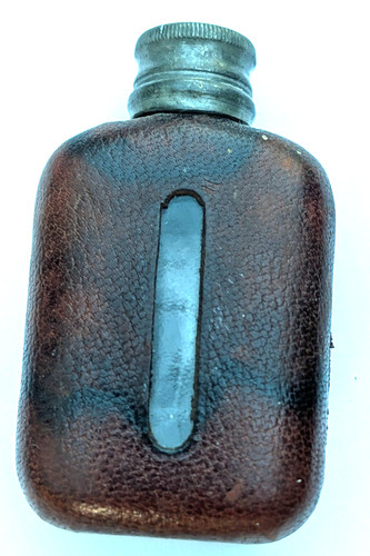 Vintage leather covered pocket - covered,