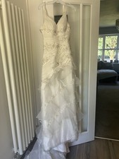 In the style of Pronovias Women's Wedding Dress Size 8 Ivory