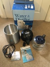 Megahome Stainless Steel Water Distiller plus Glass Carafe and 1x Carbon Filter