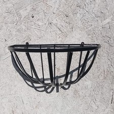 A Garden Wall Hanging Plant Pot Half Round Moon Metal Basket Planter in Black.
