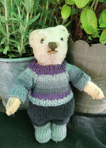 Hand knitted teddy - hand,
