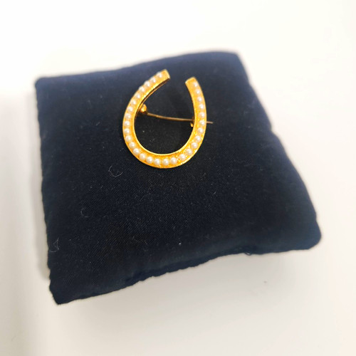 Gold tone metal horseshoe - tone,