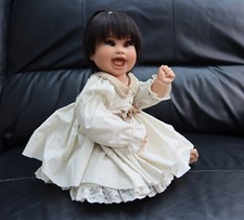 ORIENTAL PORCELAIN DOLL by