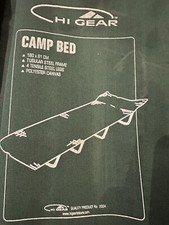 A Green Hi Gear Single Camp Bed
