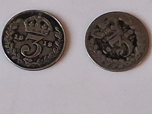 Three pence silver coins - three,