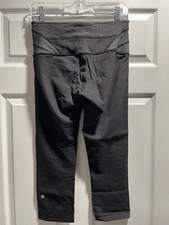 Lululemon wunder under capri size 8, black, well worn, pilling on left hip