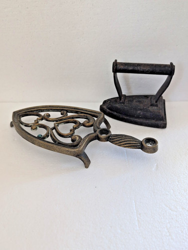 Antique cast iron sad - sad,