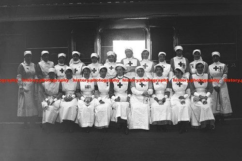 F021582 nurses near ambulance - near,