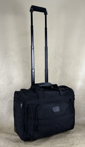 Preowned tumi black wheel - black,
