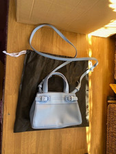 UNBRANDED LADIES PALE BLUE SMALL HANDBAG WITH DUSTBAG