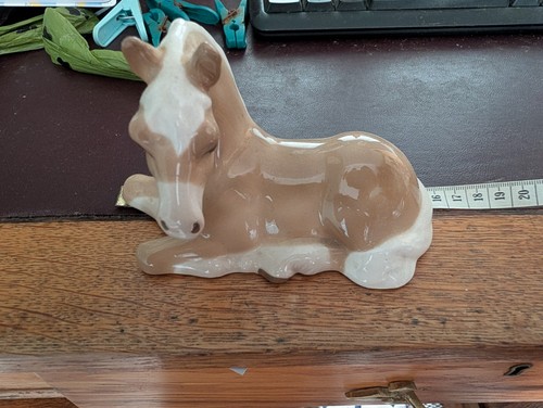 Ceramic horse foal laying down - horse/foal,