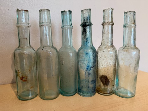 Vintage apothecary bottles - x,