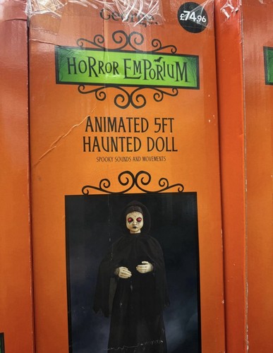 Animated haunted doll new - haunted,