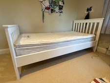 single white wooden bed frame by John Lewis and mattress 
