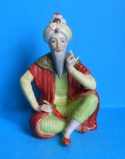 Herend ? ~ Persian Man Sitting