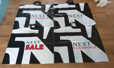 Collection of 4 next large used plastic carrier bags