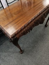 A Carved Mahogany Period Style