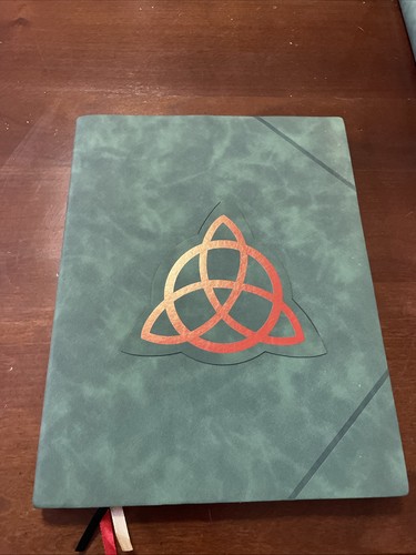 Charmed series book of - charmed,