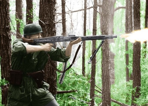 German paratrooper fires mg42 - german,