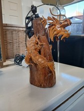 Golden Dragon on Log Statue