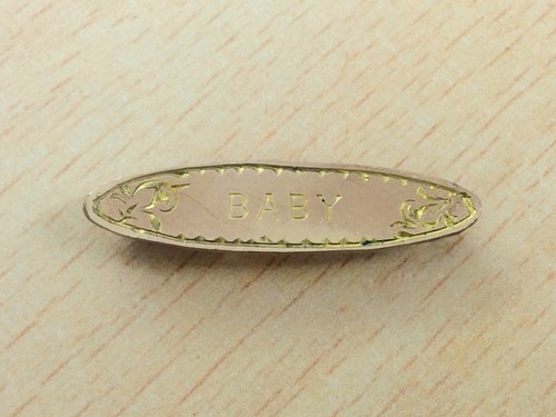 Antique gold front baby - antique,