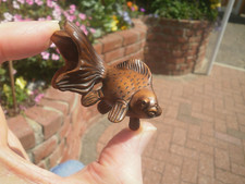 Hand Carved wood netsuke of a