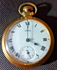 SMITHS GOLD TONE CASED POCKET WATCH - WINDUP  - WHITE FACE - BLACK HANDS - GOOD