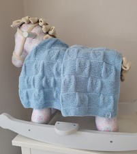 Hand knitted heart pattern