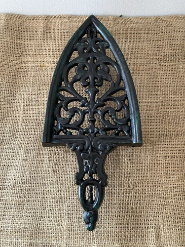 Vintage cast iron trivet black - cast,