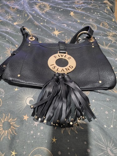 Black river island tassel - black,