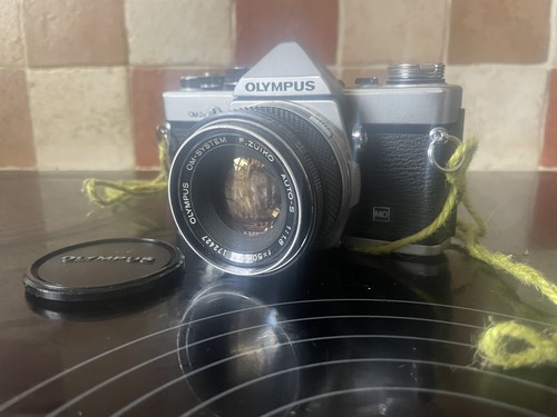 Olympus 35mm slr - om‑2n, +
