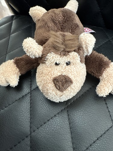 Nici lying down brown monkey - lying,