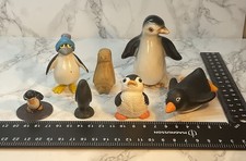 7 Small Penguin Figurines –