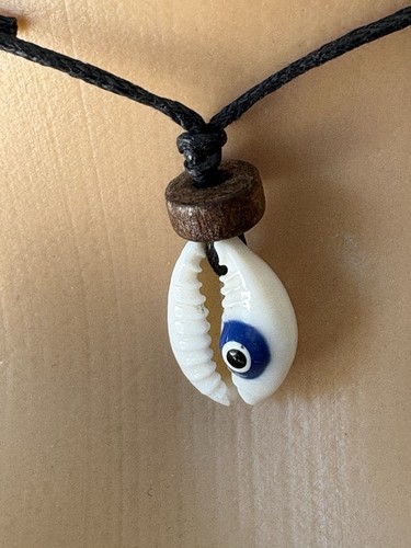 Cowrie shell evil eye charm - cowrie,