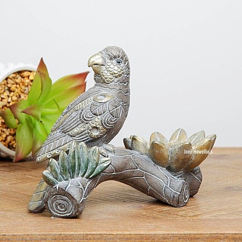 Embossed parrot figurine tea - embossed,