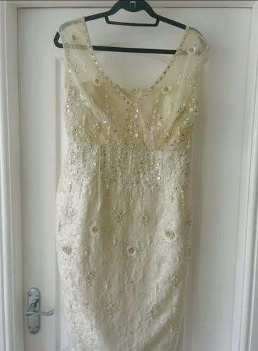 Ivory coloured pearl beaded - coloured,